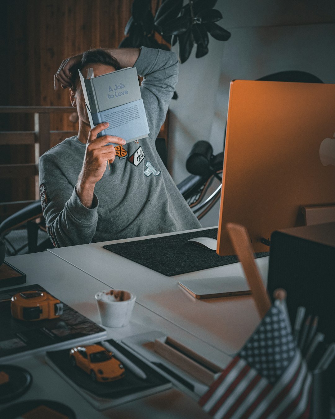person reviewing files at desk