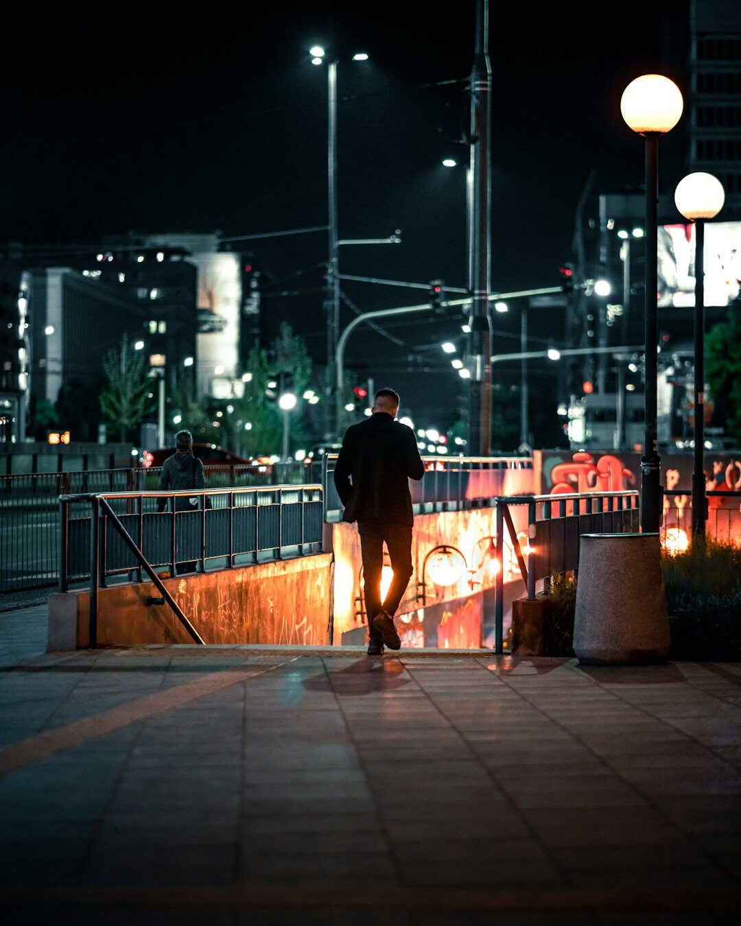detective walking city street at night